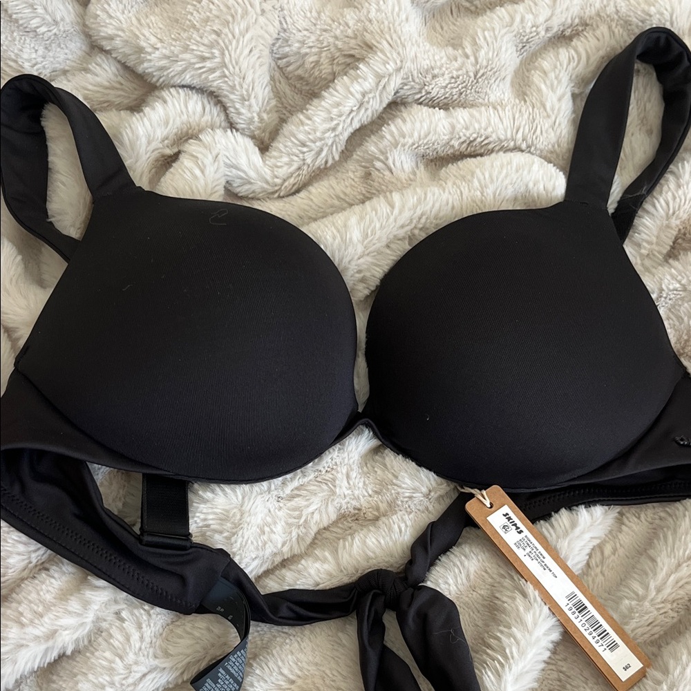 Skim’s black push up bikini top size 4